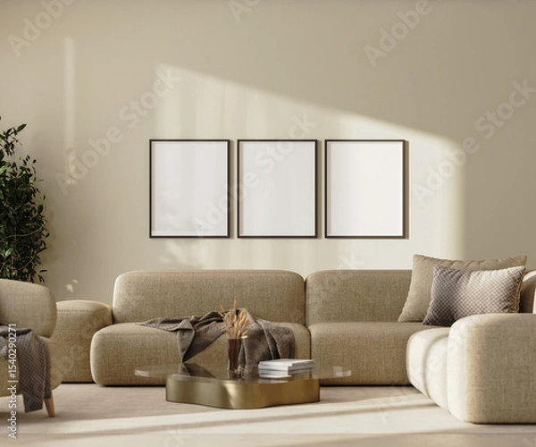 Fototapeta Three empty picture frames in modern living room interior with beige sofa wall with sunlight, 3d render