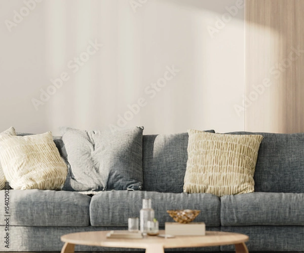 Fototapeta Close-up of a white empty wall in living room with blue sofa and table with decor, 3d render