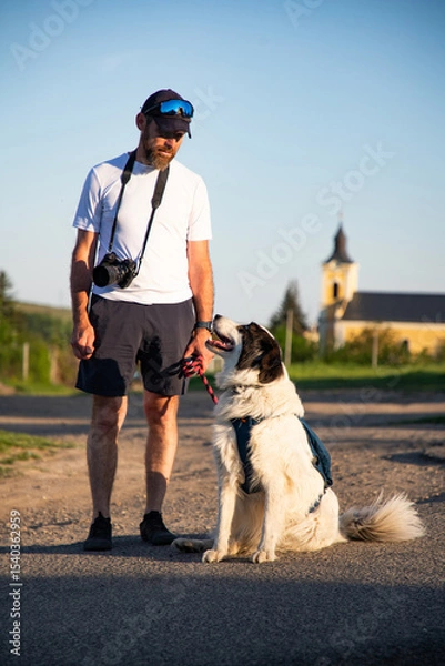 Fototapeta happy man and white dog