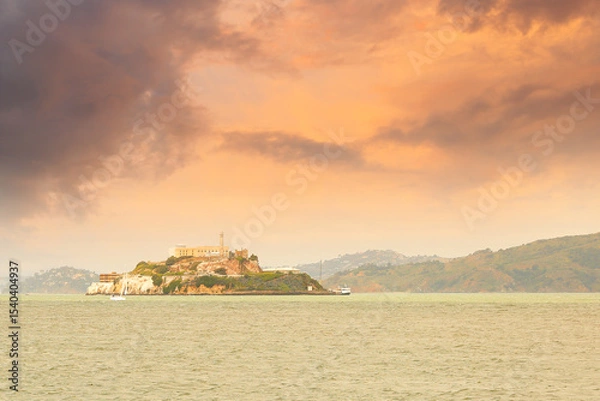 Obraz Alcatraz Island, also known as The Rock at sunset, San Francisco, California.  The island is the infamous former federal prison located in San Francisco Bay serving as a maximum-security prison.