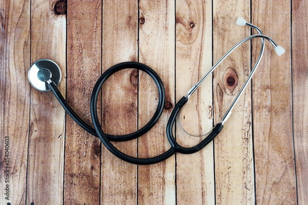 Obraz Stethoscope On Wooden Background. 