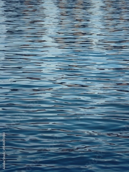 Obraz Golden blue sparkling water under the sunset