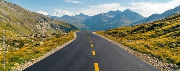 Fototapeta Construction infrastructure highway progress concept. Scenic mountain road winding through a lush landscape.