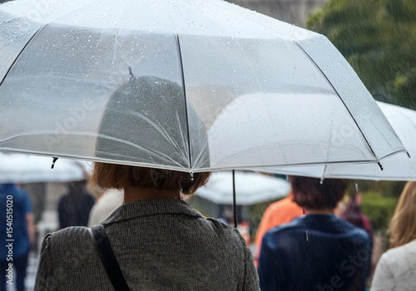 Obraz 雨の中傘をさす人たち