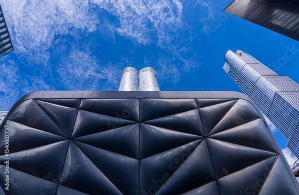 Obraz Unique pillowed and reflective retractable shell over the Shed in Hudson Yards New York City with skyscrapers above