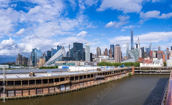 Obraz Tall office and apartment buidlings along the waterfront by Manhattan cruise terminal seen from a ship on Hudson