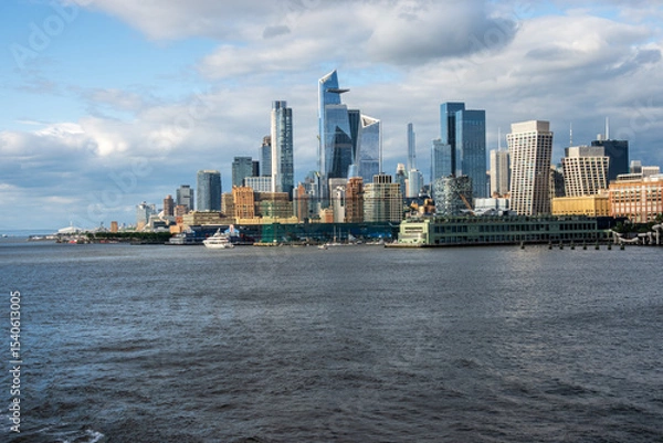 Obraz Tall office and apartment buidlings along the waterfront in Manhattan from Pier 57 towards Hudson Yards
