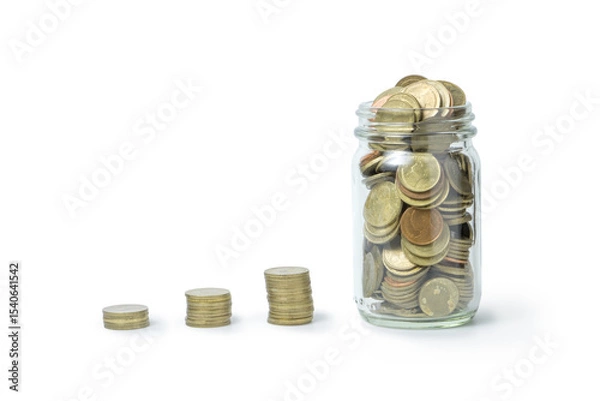 Obraz Glass Jar Filled with Coins and Stacks Representing Savings Growth
