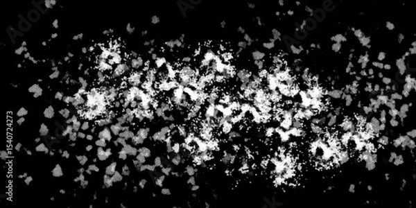 Fototapeta Snowflakes on dark background. white icy snowflakes isolated on black background, natural background. white crystalline powder on a black background. sugar dust. texture, pattern and clipping.