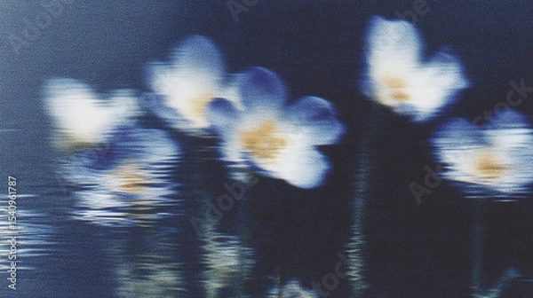 Fototapeta Blurred blue flowers reflected in water create an abstract and dreamy atmosphere in a serene natural setting