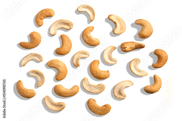 Obraz Flat lay cashew nuts isolated on white background.