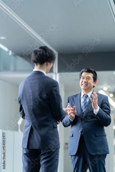 Fototapeta オフィスで働くビジネスマン　撮影強直：スカパー東京メディアセンター