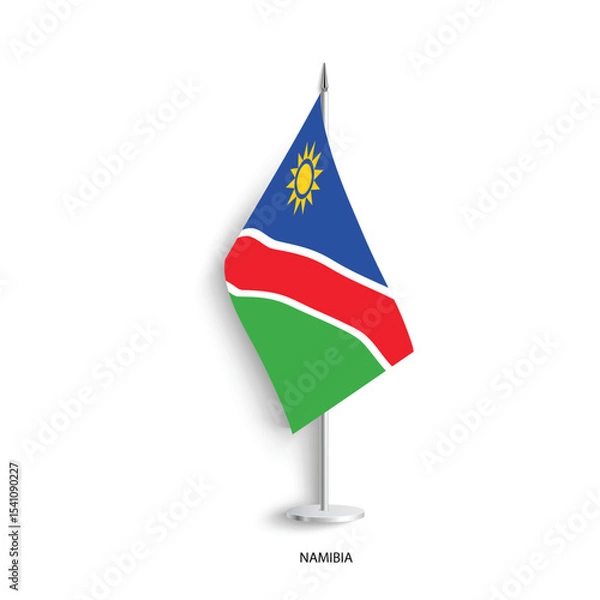 Fototapeta Namibia table flag on light grey background. Namibia desk flag isolated on grey background	