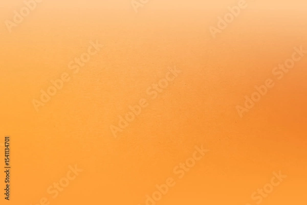 Fototapeta Warm sweet orange tone color paint on blank eco environmental friendly cardboard box paper texture background with space minimal style 