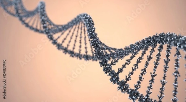 Obraz A close up view of a metallic dna strand against a light orange background in a studio setting
