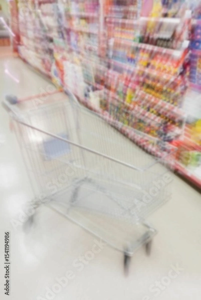 Obraz Defocused image of shopping cart