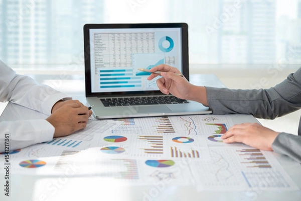Fototapeta Business financial team meeting working and present report data charts and graphs and analysis business statistic for financial planning management.