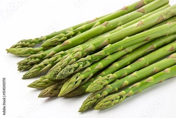 Fototapeta Fresh Green Asparagus Spears on White Background. Close-up of raw green asparagus spears arranged in a bunch, isolated on a clean white background, ready for cooking or recipes