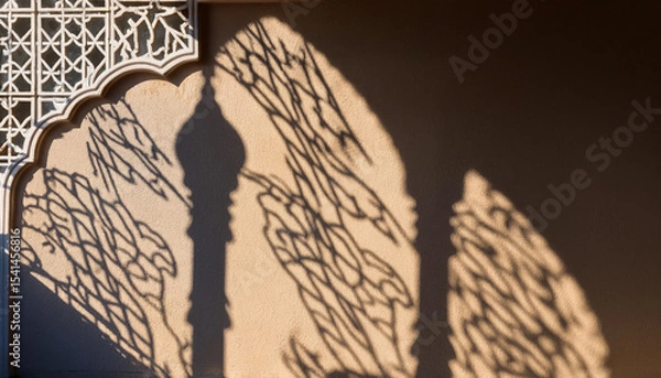 Obraz Intricate firefly arabesque shadow on a textured wall creates an enchanting background overlay for artistic projects