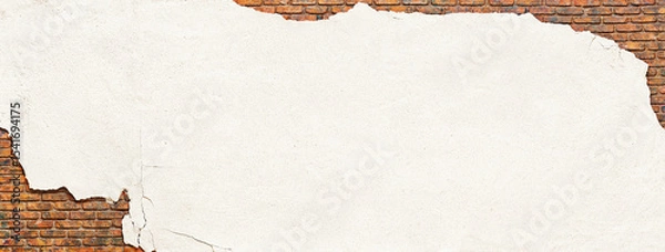 Obraz brick wall covered with crumbling plaster, peeling white stucco