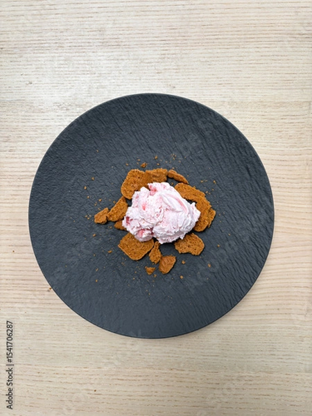 Fototapeta A plate of ice cream with cookies.
