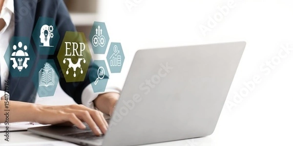 Fototapeta A young person using laptop with ERP Enterprise Resource Planning System Concept on visual screen.
