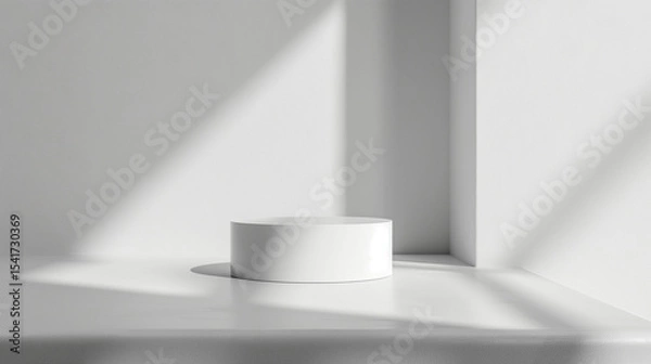 Fototapeta Minimalist white cylindrical object on clean surface with shadows  