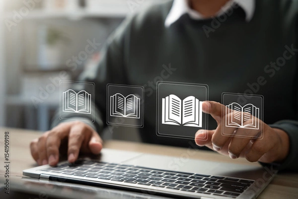 Fototapeta E-library and E-learning Concept, Person using laptop with virtual E-Book icons for online knowledge Base, Digital library, Access electronic books on Internet. Course education. Webinar technology.