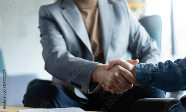 Fototapeta Partnership, teamwork and shaking hands for agreement, consulting or introduction in meeting