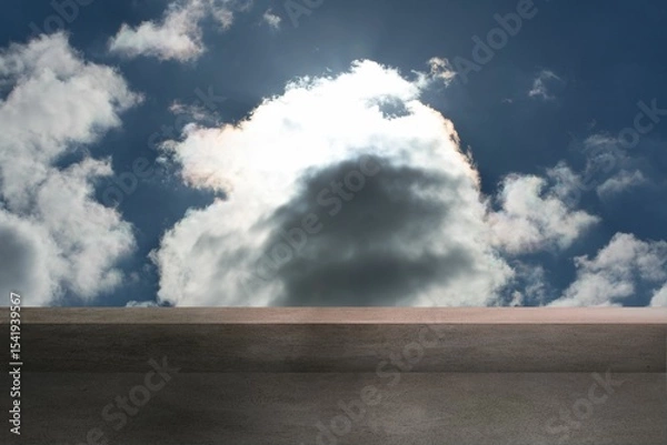 Fototapeta Flat illustration showing concrete ledge running across sky as sunlight backlighting cumulus cloud