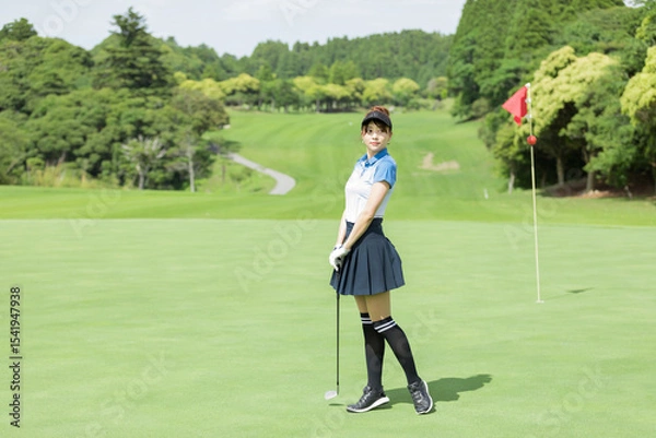 Fototapeta ゴルフを楽しむ女性