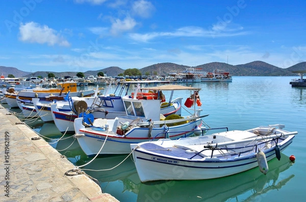 Fototapeta  Fishing boats in marina. Elounda is a small fishing town on the northern coast of the island of Crete.