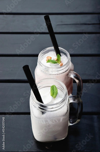 Obraz Delicious milkshakes are on the table.