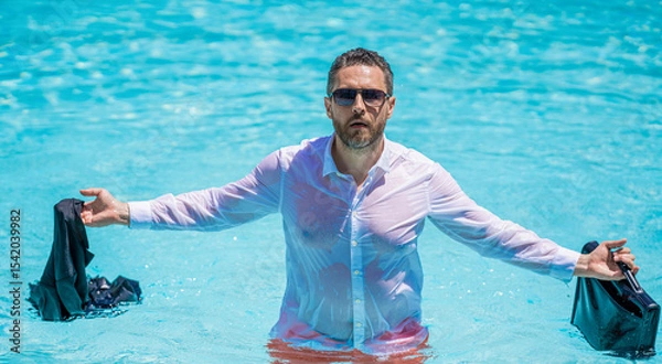 Obraz Business failure. Angry businessman on summer vacation. Wet freelancer has remote work crisis. Businessman with briefcase at swimming pool. Angry freelancer. Business trip