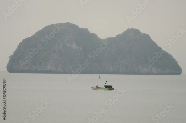 Obraz Fishing boat and limestone cliff. Lan Ha Bay. Cat Ba Archipelago. Vietnam.