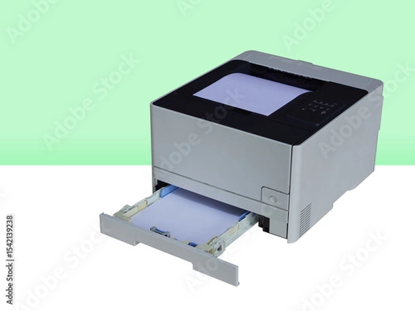 Fototapeta top view white and black laser printer on white background, lower paper input tray, object, decor, fashion, copy space