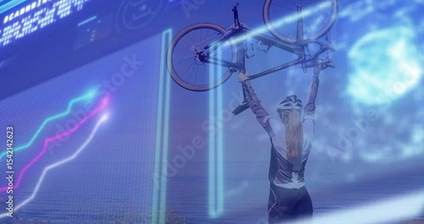 Fototapeta Holding helmeted cyclist raising road bike overhead on coastal overlook, with digital data overlays