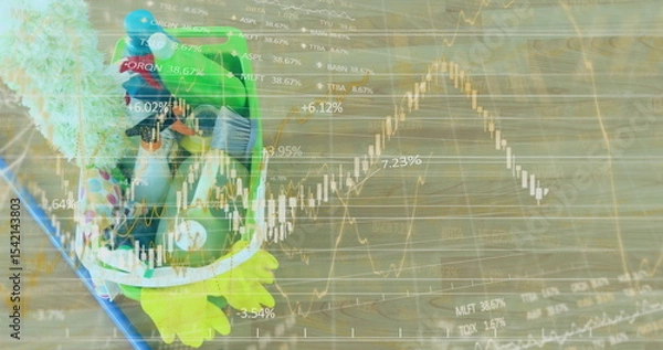 Obraz Displaying frog-shaped plush backpack resting on wooden floor with stock charts overlay, copy space
