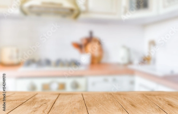 Obraz Wooden tabletop over defocused kitchen background. Minimal abstract background for product presentation. Element for design.