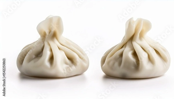 Fototapeta Two steamed dumplings on white background