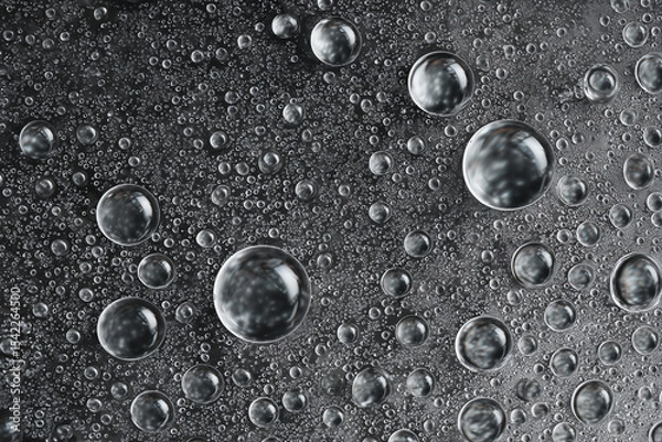 Obraz A close-up of water droplets on glass