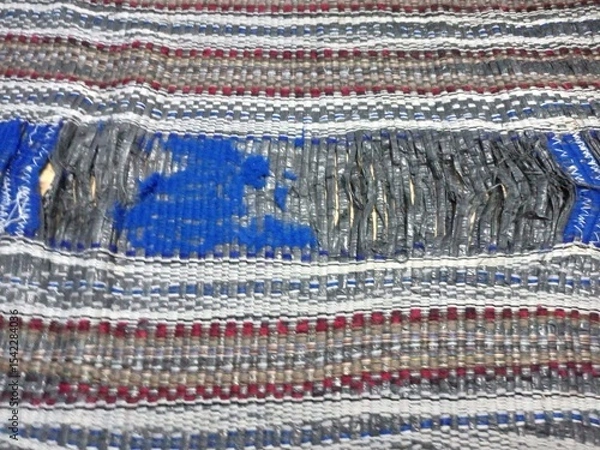 Fototapeta Distressed Striped Rag Rug with Missing Threads