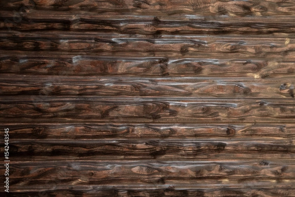 Fototapeta Dark carved wood panel with deep horizontal ripple pattern