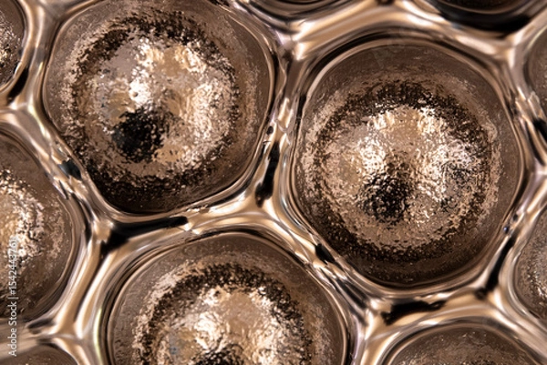 Fototapeta Abstract golden gel texture with circular bubbles