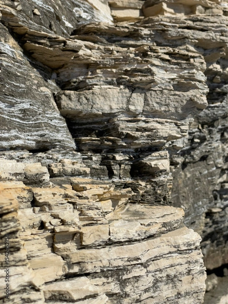 Fototapeta Layered rock cliff texture