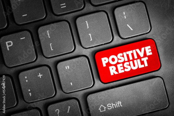 Fototapeta Positive Result text button on keyboard, concept background