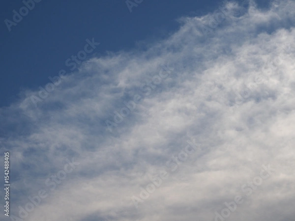 Obraz clouds over blue sky background