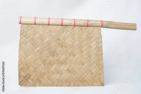 Fototapeta Woven bamboo fan envelope with red string