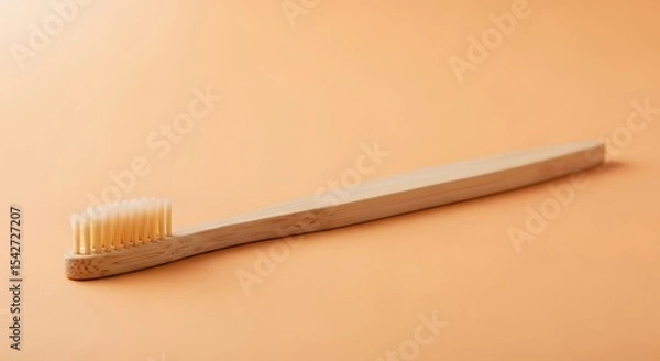 Obraz Wooden Toothbrush on Peach Background