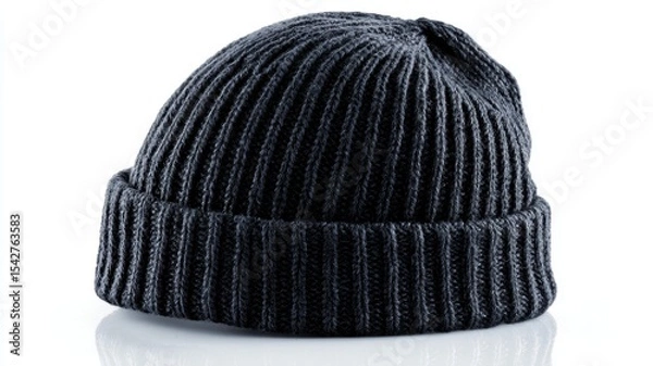 Fototapeta Cozy gray knitted beanie hat with a ribbed texture, ideal for winter fashion.